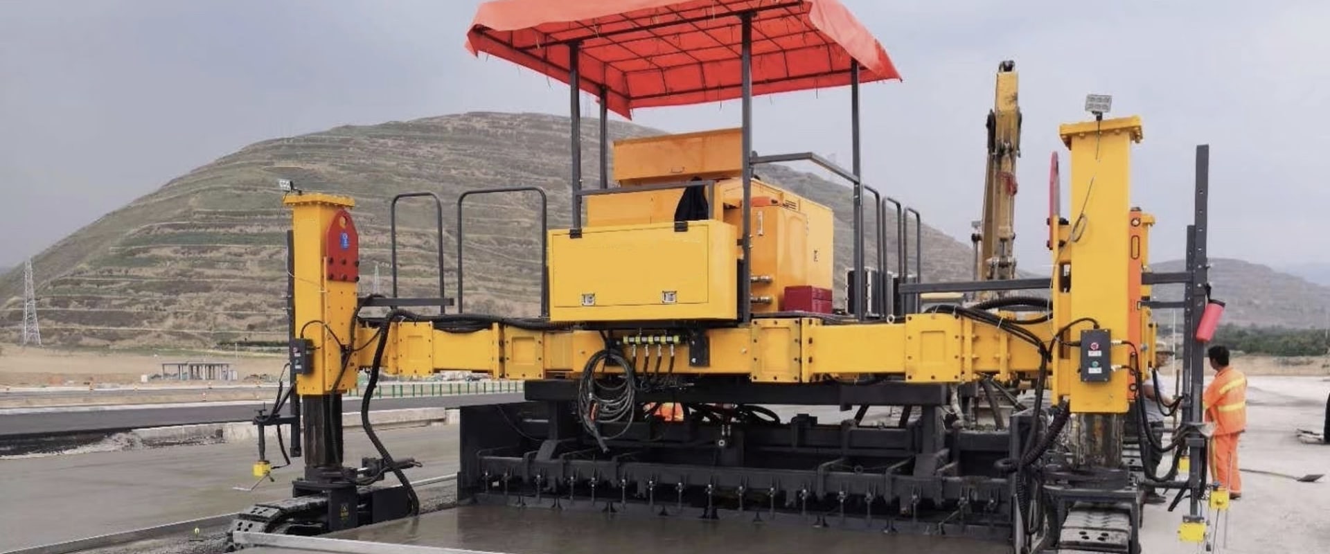 Exploring the Benefits of Automated Slipform Paving Control Systems for Asphalt and Concrete Paving